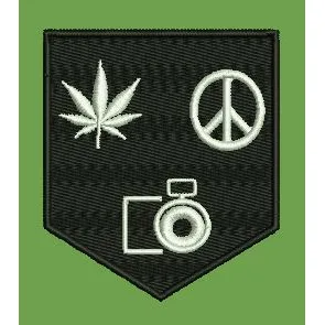 Shield Emblem with Leaf Peace and Camera Icons Embroidery Design